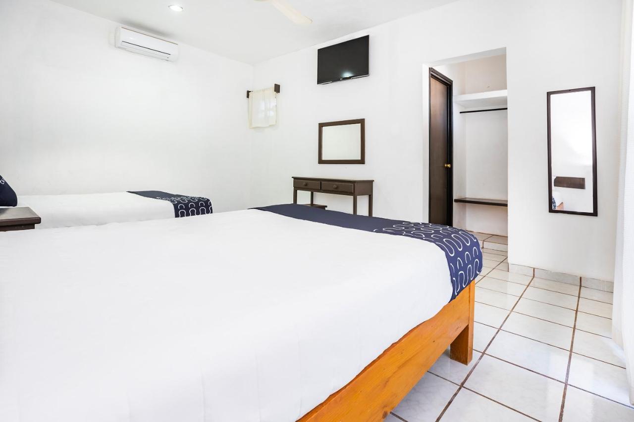 Hotel Capital O Oxtankah,Chetumal Bay Calderitas Esterno foto